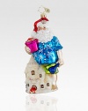 Everyone needs a break! A Hawaiian shirt-clad Santa makes a pit stop at the beach to make some impressive sandcastles. Hand-blownHand-painted5½ tallMade in Poland