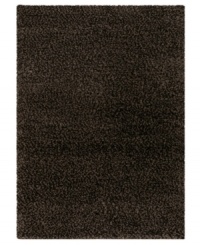 Permanent midnight. This dark-hued area rug by Couristan is created by blending different thicknesses of soft wool yarn, blissfully plush with an ultra-thick pile that's rich in both texture and tone.