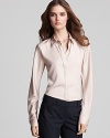 Exude classic, polished style in this tailored button-down from Theory.