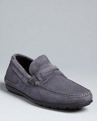 Wrought in decadent Italian suede, this loafer grounds your look in luxury.