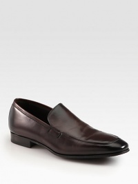 Timeless loafer crafted from soft Italian leather, finished with a finely stitched apron toe. Leather upperLeather and suede liningPadded insoleLeather and rubber soleMade in Italy