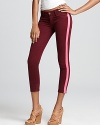 Contrast stripes down the legs add a pop of color to these Hudson skinny jeans.