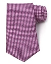 Rich color and lavish silk elevate your professional look to luxurious refinement in this handsome tie from Salvatore Ferragamo.