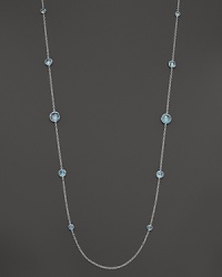 Stations of blue topaz sparkle on this sterling silver necklace from Ippolita.