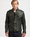 Washed leather jacket embodies a military-inspired look with shoulder epaulettes, in addition to a chest flap, zippered side pockets and a snap-button placket for maximum style and versatility.Zip frontStand collarShoulder epaulettesChest flap, zippered waist slash pocketsAbout 26 from shoulder to hemLeatherDry cleanImported