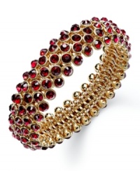 Slip on some alluring tones that add beauty to any look. Charter Club's chic bubble beaded style features siam glass accents in gold tone mixed metal. Bracelet stretches to fit wrist. Approximate diameter: 2-1/4 inches.