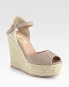 Backed by soft woven canvas, this heightened espadrille silhouette has a leather upper with glistening metal studs. Covered wedge, 5 (125mm)Covered platform, 1¾ (45mm)Compares to a 3¼ heel (80mm)Woven canvas and leather upper with metal studsAdjustable leather ankle strapLeather liningRubber trek solePadded insoleMade in Italy