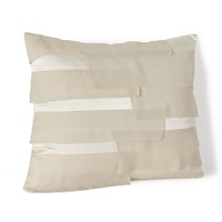 The feminine pleated chiffon overlay adorning this silk HUGO BOSS decorative pillow adds an air of intricate modernity to your decor.