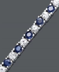 Add a sparkling splash of color to your wrist. Tennis bracelet features alternating round-cut blue sapphires (4-1/4 ct. t.w.) and white sapphires (3-3/4 ct. t.w.) set in sterling silver. Approximate length: 7 inches.