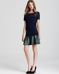 Define uptown sophistication in this Sachin + Babi dress with sheer yoke and sleeves and color-blocked leather skirt. Event-ready with glossy pumps, booties and tough-luxe accents lend it downtown edge.