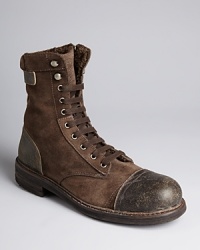 You don't have to be the Sundance Kid to wear these sharpshooter boots, crafted in supple suede with fleece and leather details for an uncommonly cool look. From Diesel.