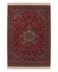 The Couristan Kashimar area rug is inspired by classic Oriental and Persian motifs, featuring a richly detailed design in warm red with grey florals. With features like 100% New Zealand semi-worsted wool, Couristan's exclusive locked in weave, crystal-point finish and hand-knotted fringes, the Medallion Antique Red rug offers a sophisticated addition to any room of your home.