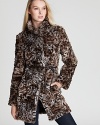 Exude animal magnetism in a belted Via Spiga faux fur coat in exotic animal print-plush and posh for day or night, workday or weekend.