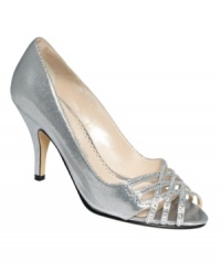 Genuinely pretty. Small straps covered in sparkle crisscross the vamp of Caparros Charmaine evening pumps.