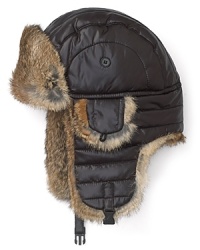 A quilted puffer hat adds a sporty element to your winter wear, but the fur trim keeps you grounded in the luxury you deserve.