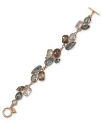 Embrace beauty. This bracelet from Carolee is crafted from gold-tone mixed metal with colorful stones providing a vibrant touch. Approximate length: 8 inches.