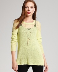 This loose-knit, laid back Free People sweater in a sunny-colored hue is lightweight and layer-perfect for fall.