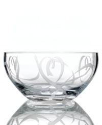 Fall for the elegant True Love giftware collection. A crystal bowl etched with a romantic heart design is a sweet way to commemorate a special anniversary or congratulate the bride and groom.