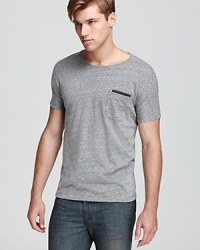 Subtle moire stripes and an applique strip at the chest pocket imbue this timeless gray tee with thoughtfully handsome details.