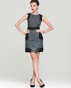 In colorful, ladylike tweed, this Laundry by Shelli Segal dress is toughened up by edgy faux leather patches.