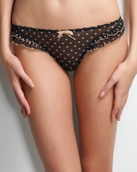 Make a sweet statement in Freya's semi-sheer thong with gold polka dots and ruffles. Style #AA1227.