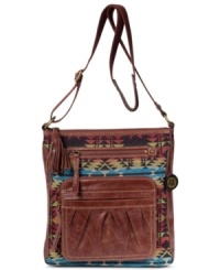 Add some bohemian-chic to your everyday accessorizing with this go-anywhere crossbody design from The Sak. Super soft leather juxtaposes with oversized zipper pulls and bold pattern for a look that's utilitarian-inspired yet still laid-back.