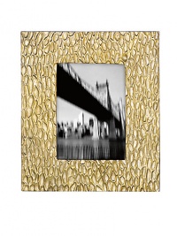 It's metal artistry with a New York edge - display your favorite memories in this hand-cast aluminum frame for a distinctive touch to any home display.HandmadeAluminum alloyImported