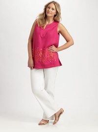 Embellished by pretty beads, this pull-on style features an ultra-feminine neckline and a relaxed silhouette.Unique split necklineSleevelessFrench bust dartsBead detailsPull-on styleAbout 30 from shoulder to hemLinenDry cleanImported