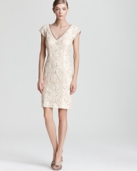 Cut a glamorous silhouette in this Sue Wong cap-sleeve dress, touting allover embellishments.