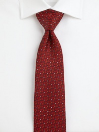 Eye-catching dots flawlessly complement this silk tie.SilkDry cleanMade in Italy