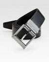 Sartorial sophistication in smooth leather with an engraved nickel buckle. About 1½ wide Leather Made in Italy 