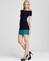 Cut a curve-defining silhouette in this body-con BCBGMAXAZRIA dress, completed by a contrast hem for a vibrant lash of color.