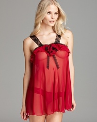 End late nights in this fanciful, sheer babydoll and matching bikini from Flora Nikrooz.