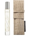 Chantecaille's beautiful signature scents now have convenience and portability. The elegant, silk-screened 0.26 oz. glass tube arrives in a khaki faux-croc pouch. Kalimantan is the ultimate sexy, exotic fragrance. Born from a trip to Borneo, it evokes the wild exotic forest, the brilliant silks, passion and charisma. 0.26 oz.