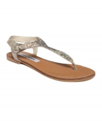 A little color, a lot of sparkle. Steve Madden's Beaming flat thong sandals will fill each step with loads of shine.