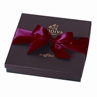 Godiva's most popular truffle assortment embellished with a red bow for the holidays.