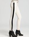 Infuse your denim archives with color blocked flair for fall--tuxedo-inspired side stripes enliven these white hot Free People skinny jeans in faux leather.