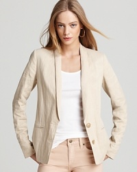 A lightweight Vince linen blazer polishes office looks with relaxed sophistication for chic workweek style.