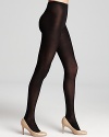 Legs look luxe in HUE's ribbed sweater tights, which feature a silky sheen for added glamour. Style #U13083.