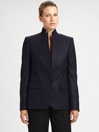 This crisp, sophisticated wool style is finished with a stand collar and unique inverted lapels.Stand collarInverted lapelsButton closureFlap pocketsButton cuffsBack ventAbout 26 from shoulder to hemWoolDry cleanMade in Italy of imported fabricModel shown is 5'11 (180cm) wearing US size 4. Additional Information Women's Premier Designer & Contemporary Size Guide 