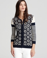 Tory Burch takes the classic cardigan on a joy ride with statement stripes and intricate crochet for a look that is casually chic.