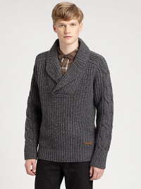 A shawl-collar sweater is impeccably knitted from superior wool, with cable knit detail at the sleeves for a classic finish to pullover sweater with modern-inspired style.Shawl collarRibbed knit cuffs and hemWoolDry cleanImported