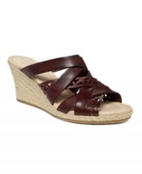 Precisely perfect for casual comfort. Paired with capris, shorts and skirts alike, the Emily slide wedge sandals by Rockport discreetly cushion every step - all you'll see if a luxurious leather espadrille design.