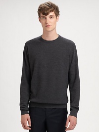 A modern must-have in soft merino wool with a textural popcorn knit and fitted ribbed details.Ribbed crewneckLong sleeves with ribbed cuffsRibbed hemMerino woolHand wash or dry cleanImported