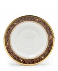 Add drama to your tabletop with this bold pattern from Noritake! Strikingly elegant, this bone china features a rich gold and red brocade border adorned with soft ivory dots and a gold band.