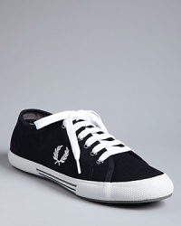 A classic sneaker design from Fred Perry grounds your look in casual coolness.