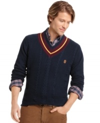 Develop your swing in preppy style with this v-neck tennis sweater from Izod.