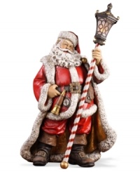 Rose-cheeked and with a joyful smile upon his face, Santa creates a festive holiday mood dressed in his traditional attire and holding a lantern.