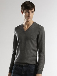 Modern-fit sweater shaped in superior Italian wool.V-neckRibbed knit collar, cuffs and hemWoolDry cleanMade in Italy