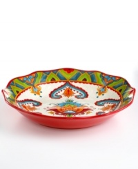 The big bold florals and exuberant hues of the Pasha pasta bowl by Tabletops Unlimited get everyone excited about eating in. A scalloped edge adds extra flair.